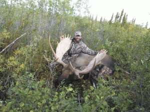 Aaron Daniel with Moose