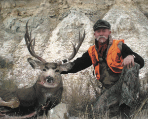 Bruce Fox with Mule Deer