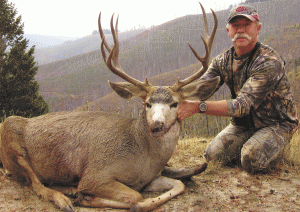 Bruce Fox with Mule Deer